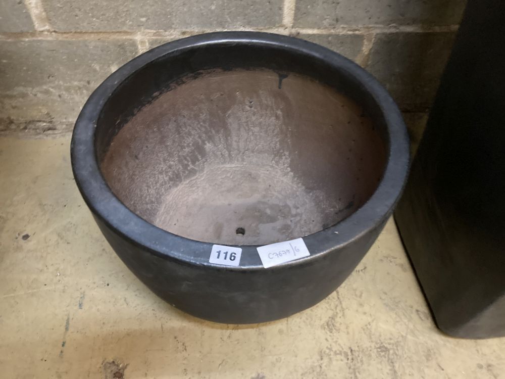 A circular grey glazed garden planter, width 46cm, height 29cm